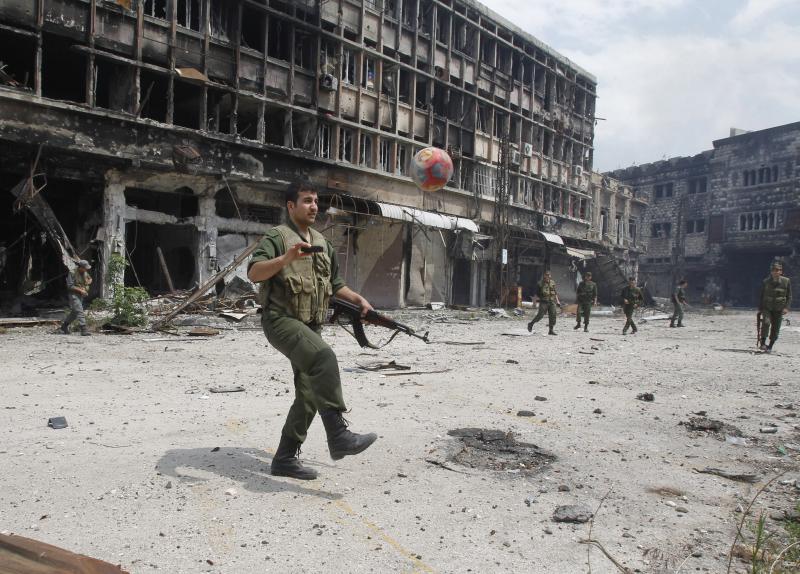 FA Syrian Soldier plays football