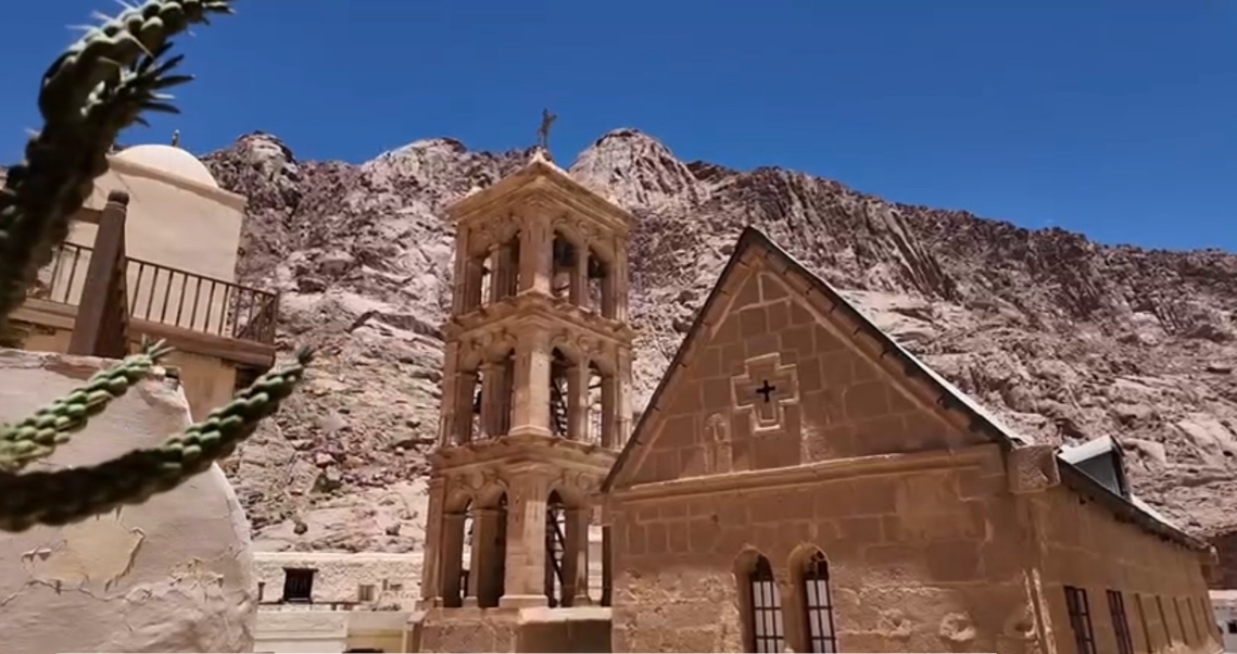 A stone church with a bell tower

AI-generated content may be incorrect.