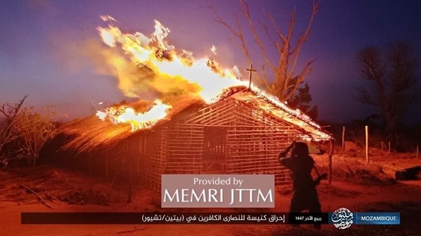 A building on fire with a cross on top

AI-generated content may be incorrect.