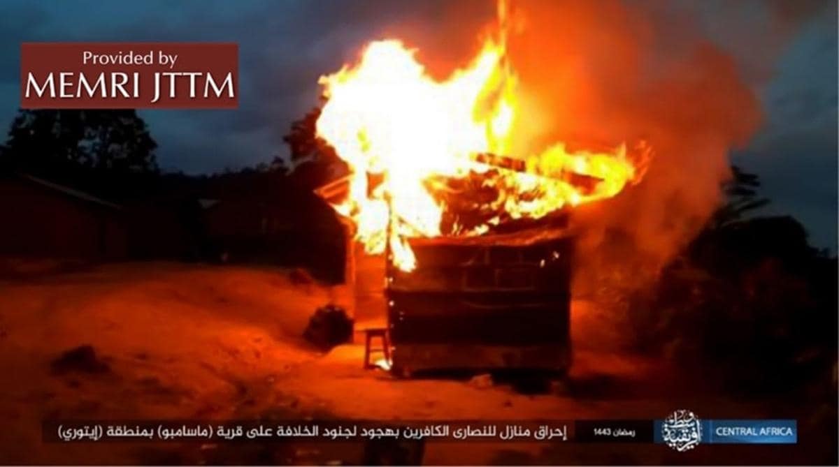 A building on fire with smoke and flames

AI-generated content may be incorrect.